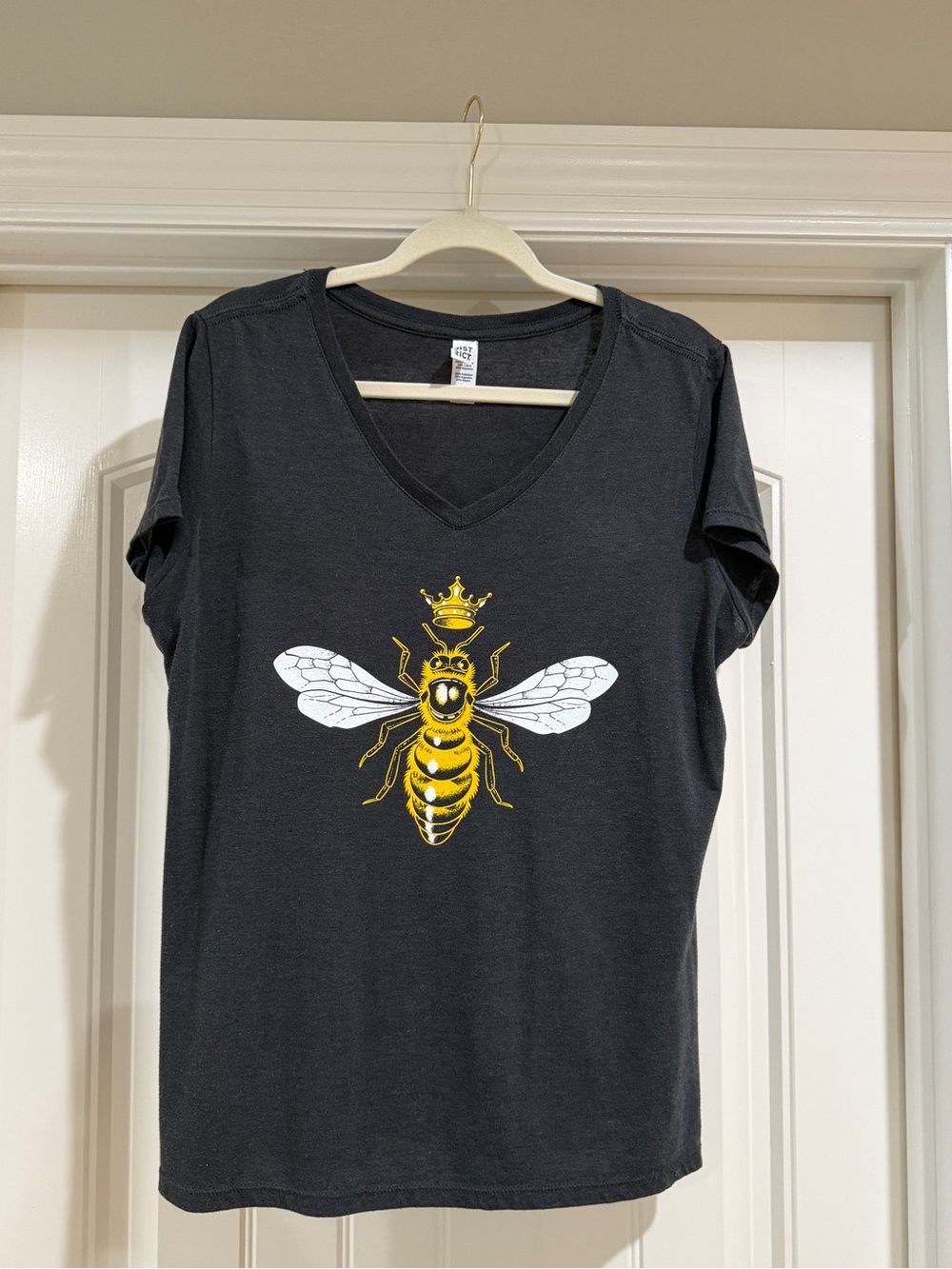 District Black V-Neck Bee Graphic Tee with Yellow and White Print